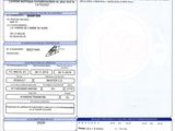 a car registration form with a picture of a car in the background