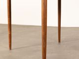 the table is made of solid wood and has four legs