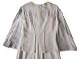 an image of a white dress with a long jacket on it