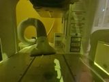 a machine that is cutting a piece of wood on a table