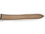 the watch is made of leather and has a brown strap