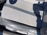 a picture of a car seat with the sun shining on it