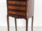 an old wooden chest of drawers with a drawer on one side and a drawer on the other side
