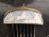 a hair comb with a picture of a horse on it