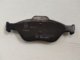a close up of a brake caliper on a table