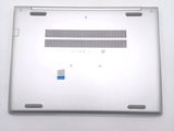 an open laptop computer sitting on top of a white table