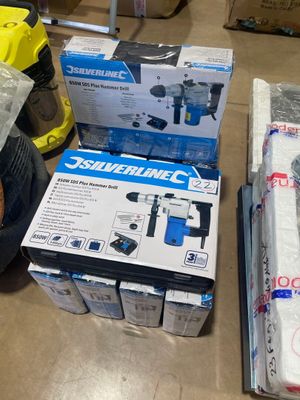 two boxes of tools on the floor next to each other
