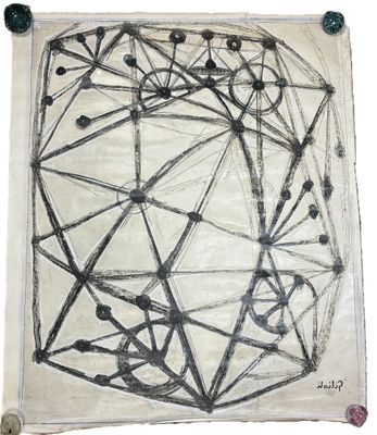 une image représentant un dessin sur une feuille de papier posée sur une surface blanche