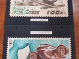 two stamps with a picture of a plane and a plane on them