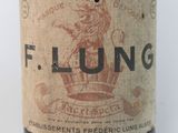 a close up of a bottle of wine with a lion on it