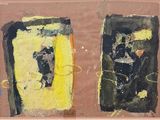 deux œuvres d'art posées sur une table