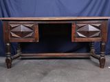 an old wooden desk with two drawers and a drawer underneath it