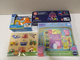 a box of toys on a table with a box of magnets