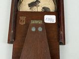 a clock that is on display on the wall