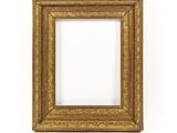 an old gold frame with a white background