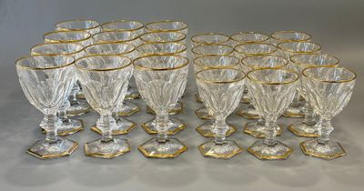 a lot of glasses that are sitting on a table