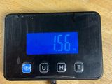 an image of a digital thermostar on a wooden table