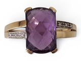 an amethorate and diamond ring on a white background