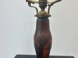 a lamp that is on top of a black table