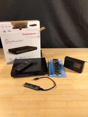 Lot d'une télécommande et un disque dur externe Philips, un …