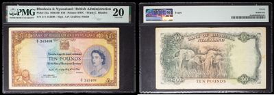 three different types of currency are on display in a display case