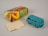 a small blue toy bus next to a box of tissues