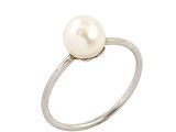 a close up of a pearl ring on a white background
