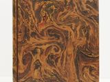 an old book with a brown and black swirl design on it