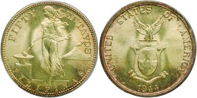 a close up of two gold coins on a white background