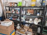 many boxes and boxes on the shelves in the garage