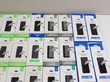 several boxes of cell phones sitting on top of a white table