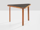 an image of a small table with a black top on a white surface