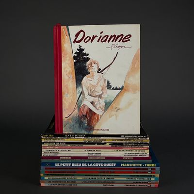 books stacked on top of each other on a black surface