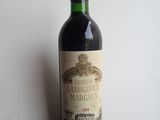 a bottle of wine that is sitting on a table