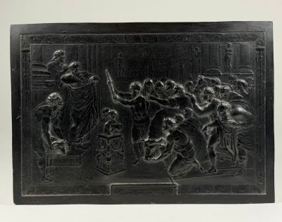an image of a black relief of a group of people on a stage