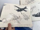 a person holding a piece of paper with a drawing of a plane