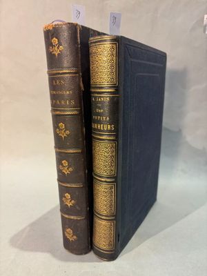the two books are lined up in a row on the table