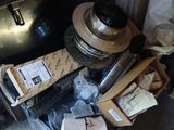 a suitcase full of items sitting on the floor