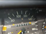 a close up of a speedometer in a car