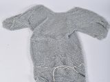 a picture of a knitted bunny on a white surface