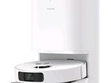 une image d'un aspirateur robotisé sur une surface blanche