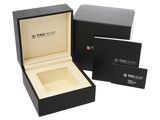 a close up of a box with a watch inside of it