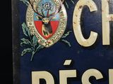 a blue sign with a deer on it that says cheval reserve