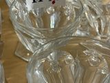 a lot of empty glass bowls on a table