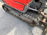 a close up of a tractor tire on the ground