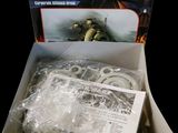 the box is open to show the contents of a star wars action figure set