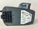 a close up of a power cord connected to a computer mouse