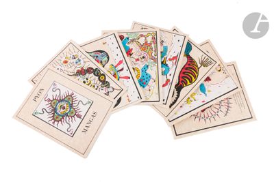 a group of cards with different designs on them on a white surface