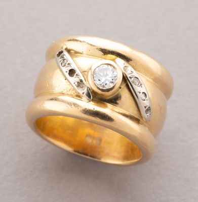 an image of a gold ring with diamonds on it