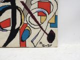 a picture of a cross - stitch purse with a design on it
